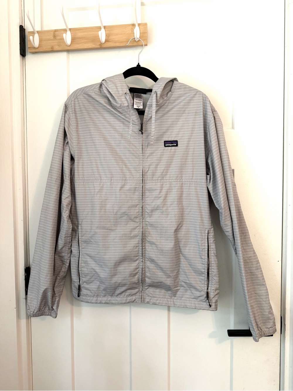 Patagonia Light Gray Striped Hooded Windbreaker. Light and variable hoody